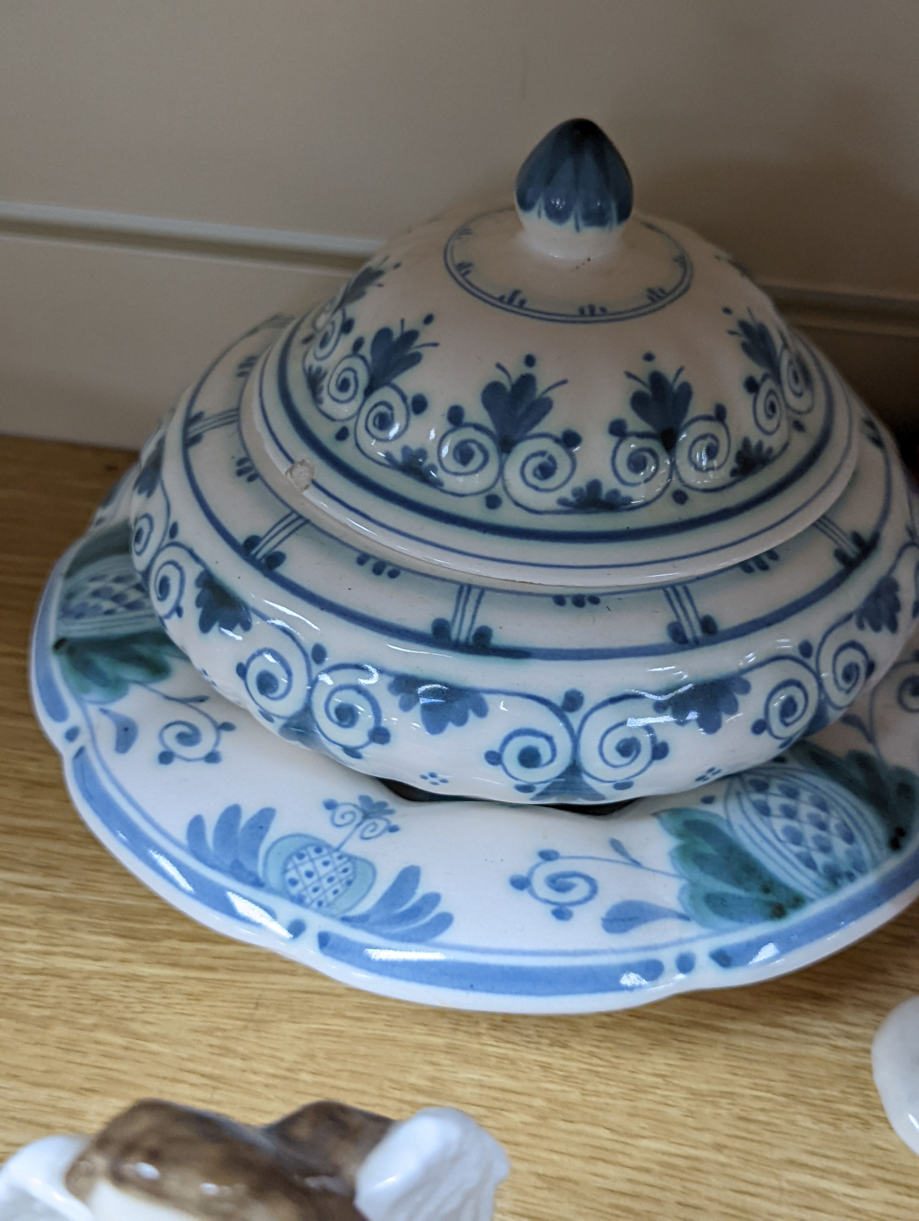 A collection of Royal Doulton figures including Bunnykins, a Doulton vase and other items
